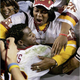Illustration for article titled Clinton Portis Can Carry The Load, But Can He Carry His Team To The Playoffs?